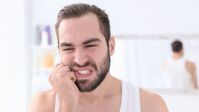 dente com cárie doendo